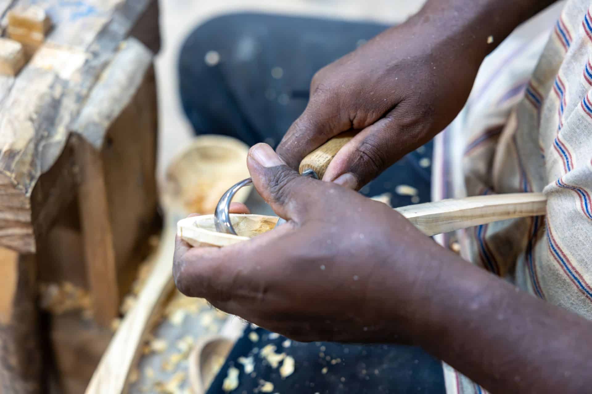 Handcrafted olive wood spoons being shaped