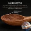 Premium gift box containing hand-carved olive wood kitchen utensils (spoons and spatulas) made from Mediterranean olive wood by Greek artisans, emphasizing ethical craftsmanship, traditional woodworking, and purpose-driven gifting under the Lesvos Woodcraft brand.