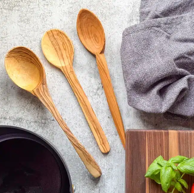 olive wood utensils olive wood spoons wooden kitchen utensils set wooden utensils wooden cooking spoons wooden serving spoons lesvos woodcraft llc hand carved spoons unique gifts gifts with an impact olive wood spoon olive wood hand carved wooden spoons non toxic cooking utensils big cooking spoon durable wooden spoon fair trade products Fair trade gifts handmade wooden spoon large wooden spoon Soup ladle Wooden ladle Soup spoons Olive wood soup ladle